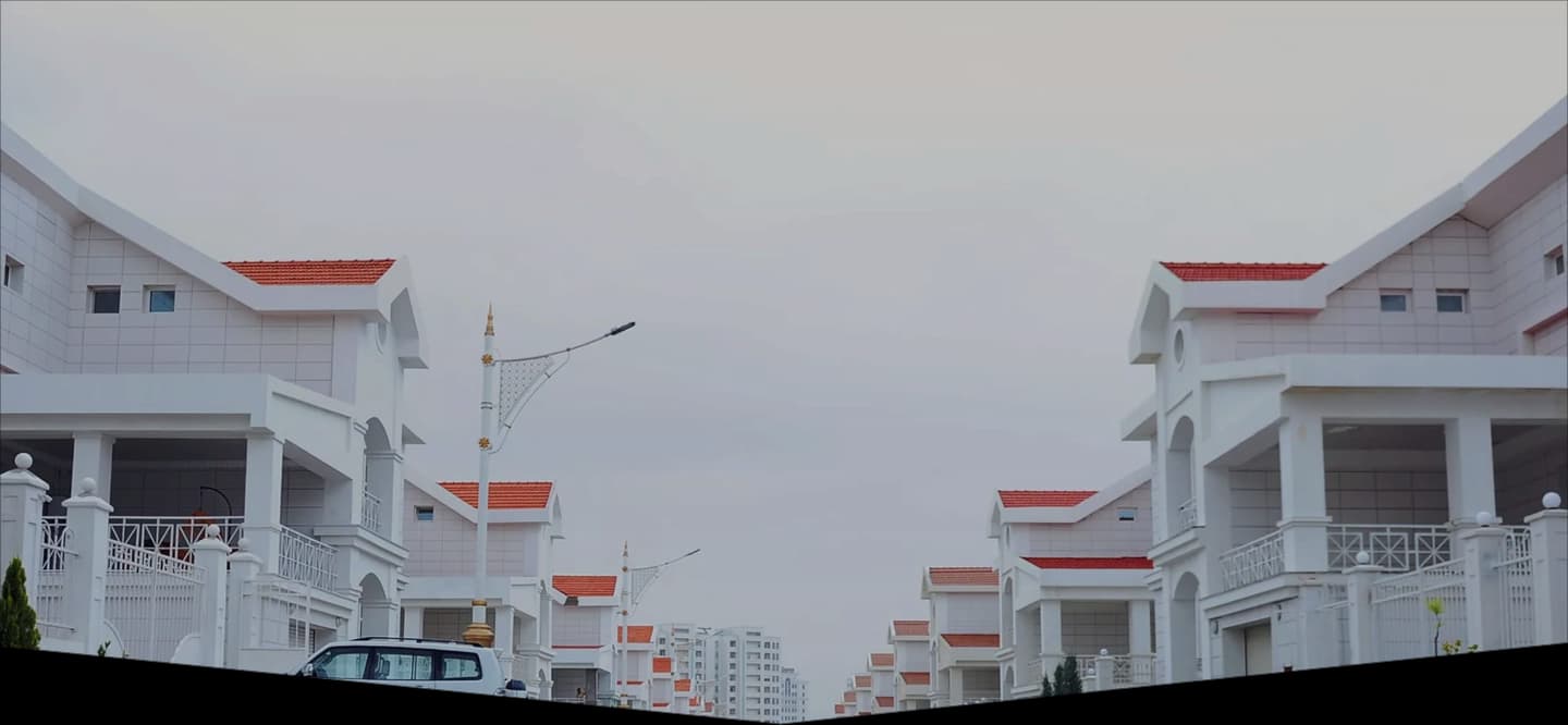 Background of white houses with red roofs